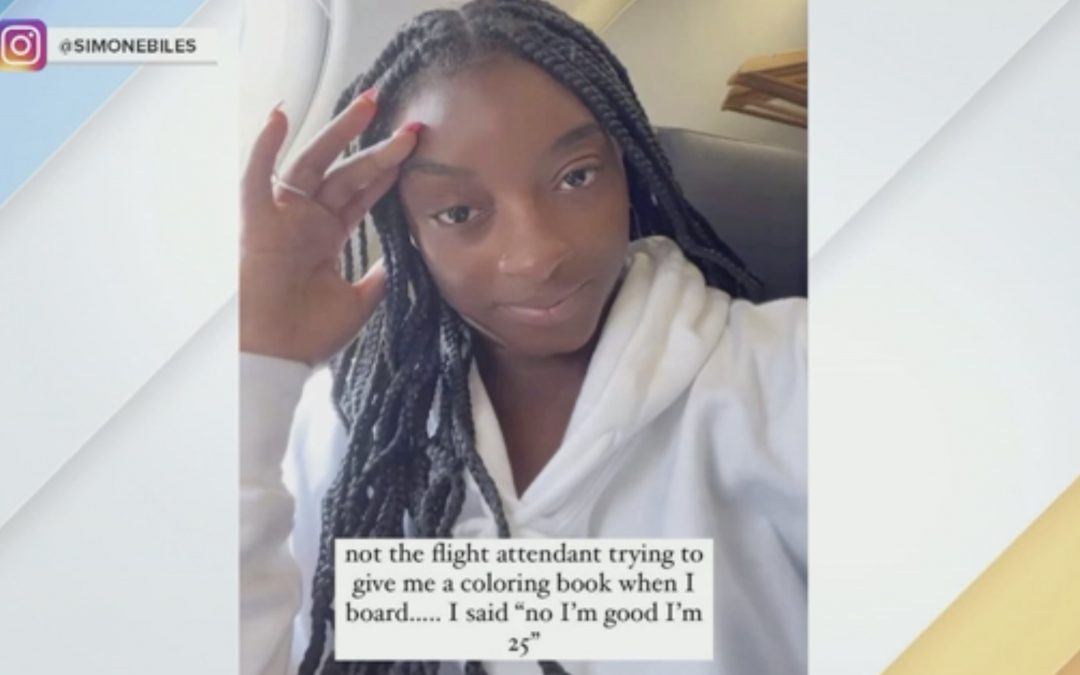 Simone Biles offered coloring book on Flight